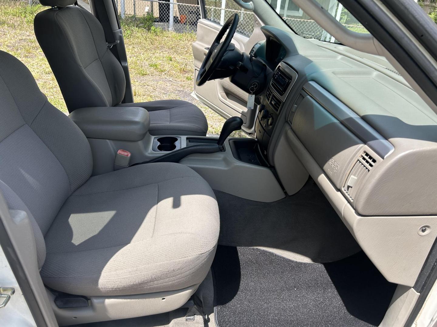 2002 Jeep Grand Cherokee Laredo 2WD (1J4GX48S32C) with an 4.0L L6 OHV 12V engine, 4-Speed Automatic Overdrive transmission, located at 1758 Cassat Ave., Jacksonville, FL, 32210, (904) 384-2799, 30.286720, -81.730652 - CASH SPECIAL*****$2999.00 PLUS TAX, TAG, AND TITLE*****2002 JEEP GRAND CHEROKEE LAREDO*****207,873 MILES*****CHECK THE PICS OR COME SEE THIS ONE IN PERSON EXTRA EXTRA CLEAN!!!! ICE COLD AIR CONDITONING RUNS GREAT CALL US @ 904-384-2799 TODAY THIS ONE'S A WINNER!!!! - Photo#13
