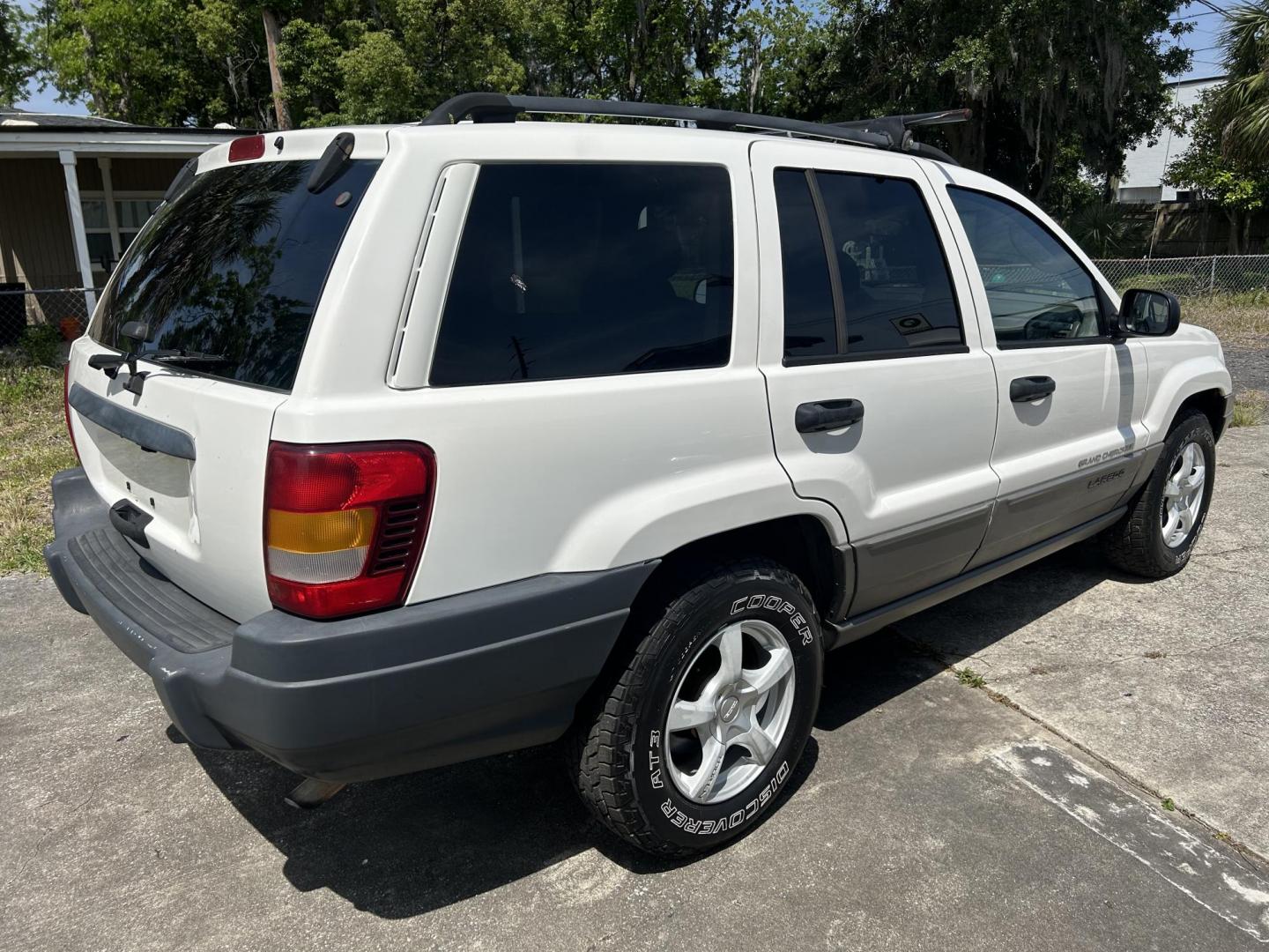 2002 Jeep Grand Cherokee Laredo 2WD (1J4GX48S32C) with an 4.0L L6 OHV 12V engine, 4-Speed Automatic Overdrive transmission, located at 1758 Cassat Ave., Jacksonville, FL, 32210, (904) 384-2799, 30.286720, -81.730652 - CASH SPECIAL*****$2999.00 PLUS TAX, TAG, AND TITLE*****2002 JEEP GRAND CHEROKEE LAREDO*****207,873 MILES*****CHECK THE PICS OR COME SEE THIS ONE IN PERSON EXTRA EXTRA CLEAN!!!! ICE COLD AIR CONDITONING RUNS GREAT CALL US @ 904-384-2799 TODAY THIS ONE'S A WINNER!!!! - Photo#5