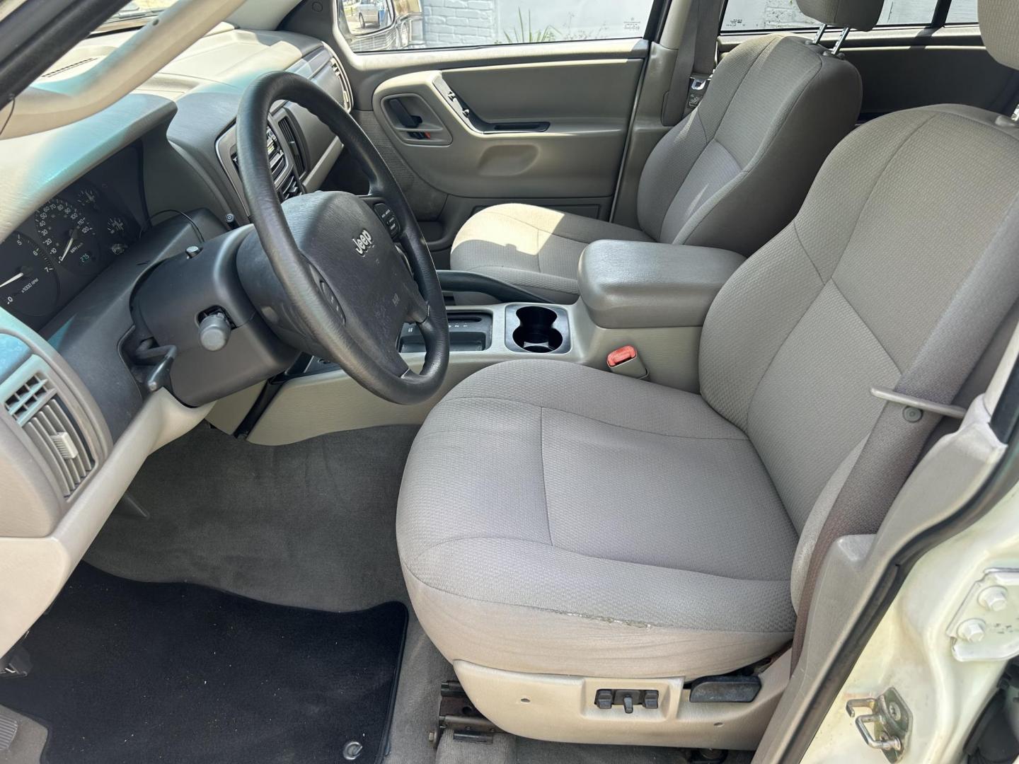 2002 Jeep Grand Cherokee Laredo 2WD (1J4GX48S32C) with an 4.0L L6 OHV 12V engine, 4-Speed Automatic Overdrive transmission, located at 1758 Cassat Ave., Jacksonville, FL, 32210, (904) 384-2799, 30.286720, -81.730652 - CASH SPECIAL*****$2999.00 PLUS TAX, TAG, AND TITLE*****2002 JEEP GRAND CHEROKEE LAREDO*****207,873 MILES*****CHECK THE PICS OR COME SEE THIS ONE IN PERSON EXTRA EXTRA CLEAN!!!! ICE COLD AIR CONDITONING RUNS GREAT CALL US @ 904-384-2799 TODAY THIS ONE'S A WINNER!!!! - Photo#6