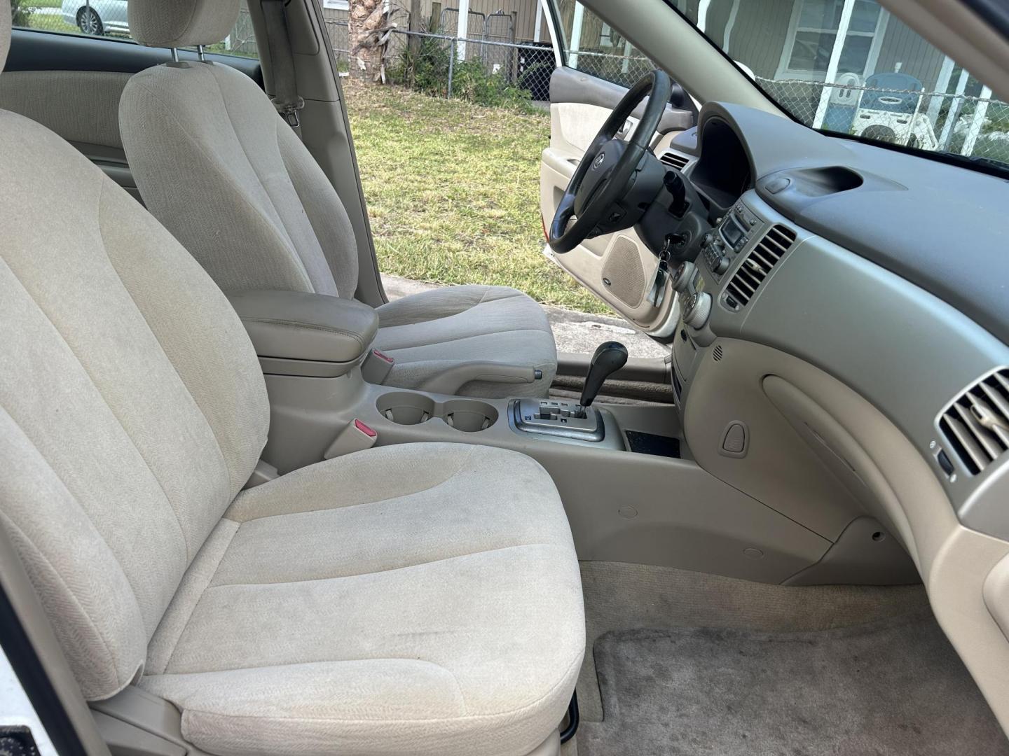 2006 Kia Optima EX V6 (KNAGE124065) with an 2.7L V6 24V DOHC engine, 4-Speed Automatic Overdrive transmission, located at 1758 Cassat Ave., Jacksonville, FL, 32210, (904) 384-2799, 30.286720, -81.730652 - ***** CASH SPECIAL ***** LOW MILEAGE ONLY 127,058 ***** $3499.00 PLUS TAX, TAG, AND TITLE ***** 2006 KIA OPTIMA EX V6 ***** 4-DOOR AUTOMATIC TRANSMISSION EXTRA CLEAN RUNS GREAT AND WELL-MAINTAINED ICE-COLD AIR CONDITIONING THIS ONE'S A STEAL!!!! CALL ROB @ 904-384-2799 - Photo#10