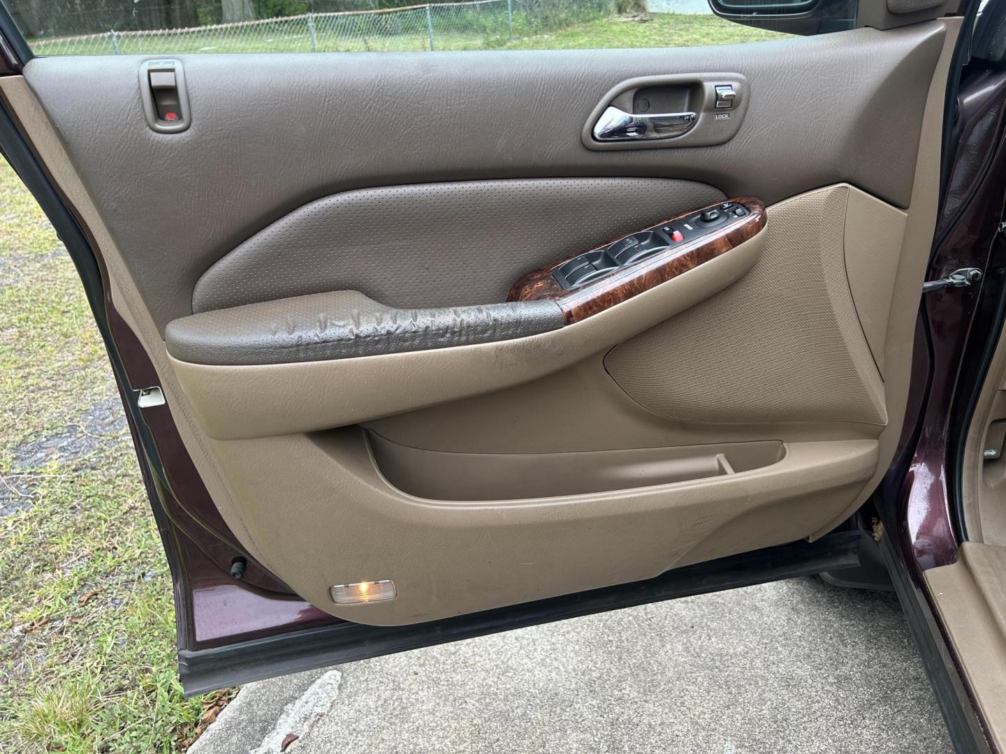 2001 Acura MDX Base w/ Nav System (2HNYD18421H) with an 3.5L V6 SOHC 24V engine, 5-Speed Automatic Overdrive transmission, located at 1758 Cassat Ave., Jacksonville, FL, 32210, (904) 384-2799, 30.286720, -81.730652 - ***** 3499.00 PLUS TAX, TAG, AND TITLE ***** CASH SPECIAL ***** 2001 ACURA MDX 216,216 MILES THIRD ROW SEATING EXTRA CLEAN CHECK THE PICS THIS ONE DOESN'T DISSAPOINT ICE-COLD AIR-CONDITIONING RUNS AND DRIVES GREAT LEATHER SUNROOF ALLOYS GOLD PACKAGE AND MORE CALL ROB @ 904-384-2799 TODAY YOU WON'T R - Photo#6