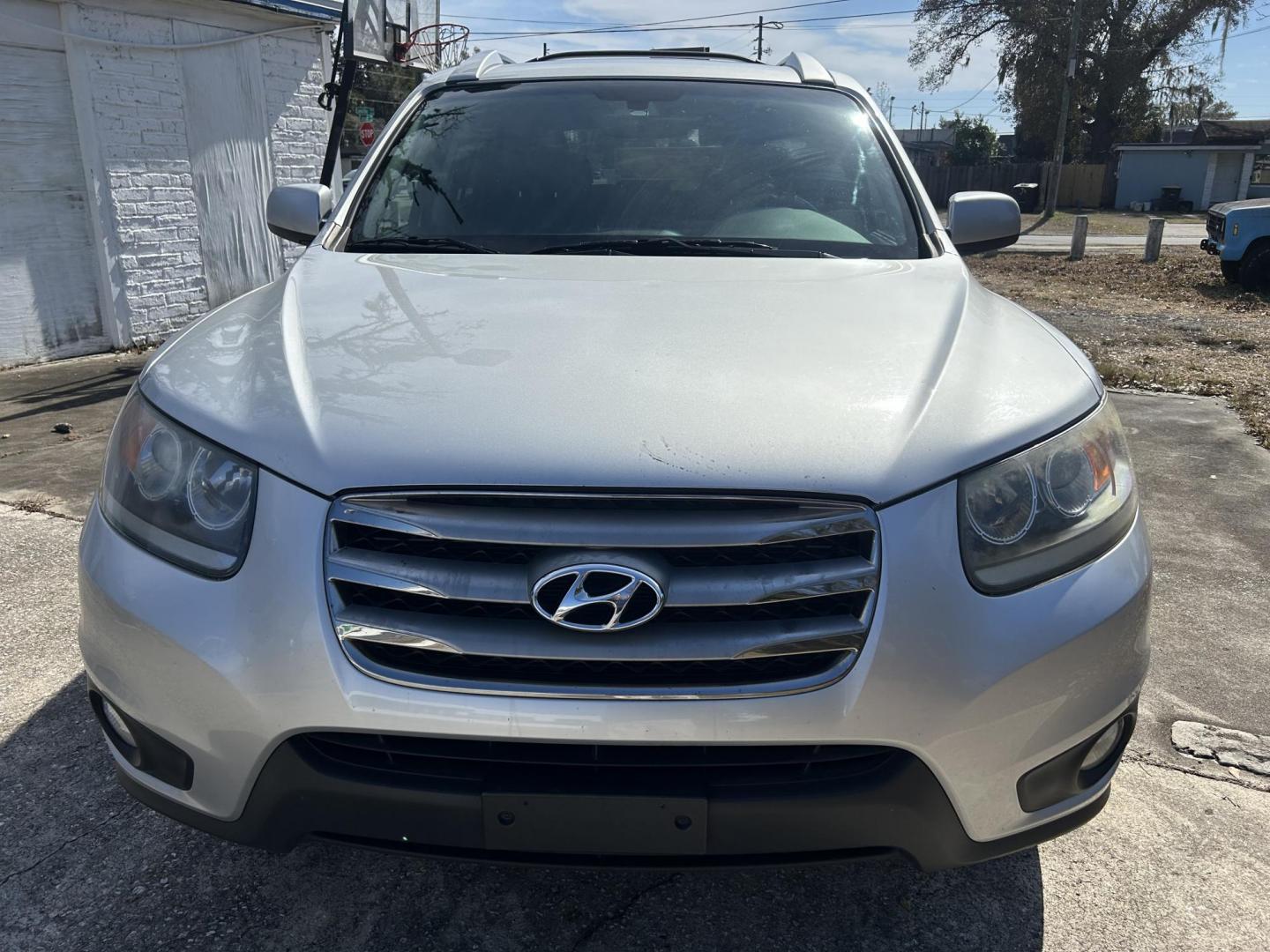 2012 Hyundai Santa Fe Limited 3.5 4WD (5XYZKDAG8CG) with an 3.5L V6 DOHC 24V engine, 6-Speed Automatic transmission, located at 1758 Cassat Ave., Jacksonville, FL, 32210, (904) 384-2799, 30.286720, -81.730652 - CASH SPECIAL ***** $4488.00 PLUS TAX, TAG, AND TITLE ***** EXTRA, EXTRA CLEAN 2012 HYUNDAI SANTA FE AWD LIMITED MODEL LEATHER SUNROOF ALLOYS RUNNING BOARDS HEATED SEATS LOOKS AND DRIVES 100% WELL MAINTAINED AND CARED FOR CALL ROB @ 904-384-2799 YOU WON'T REGRET IT! - Photo#0