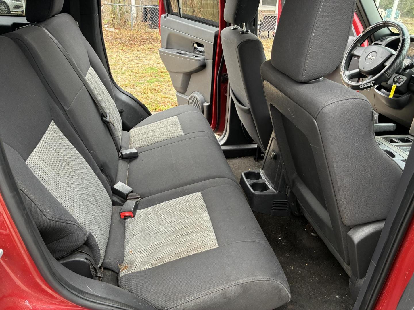 2009 Jeep Liberty Sport 2WD (1J8GP28K99W) with an 3.7L V6 SOHC 12V engine, 4-Speed Automatic transmission, located at 1758 Cassat Ave., Jacksonville, FL, 32210, (904) 384-2799, 30.286720, -81.730652 - ***** CASH SPECIAL ***** 2009 JEEP LIBERTY SPORT MODEL ***** $2888.00 PLUS TAX, TAG, AND TITLE ***** 173,017 MILES 4-DOOR ALLOYS RUNS GREAT TINT ICE-COLD AIR-CONDITIONING TAX TIME BLOWOUT CALL ROB @ 904-384-2799 TODAY! - Photo#14