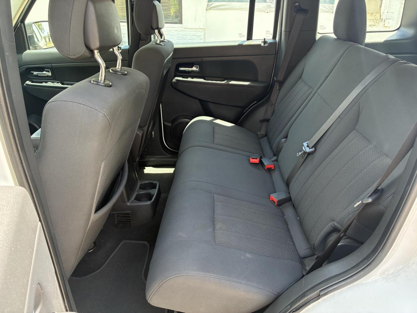2012 Jeep Liberty Sport 2WD (1C4PJLAK6CW) with an 3.7L V6 SOHC 12V engine, 4-Speed Automatic transmission, located at 1758 Cassat Ave., Jacksonville, FL, 32210, (904) 384-2799, 30.286720, -81.730652 - ***** CASH SPECIAL ***** 2012 JEEP LIBERTY ***** $3944.00 PLUS TAX, TAG, AND TITLE ***** 189,478 MILES EXTRA CLEAN PREMIUM ALLOYS 4-DOOR LOOKS AND RUNS GREAT ICE-COLD-AIR-CONDITIONING DON'T HESITATE CALL ROB TODAY @ 904-384-2799 - Photo#10